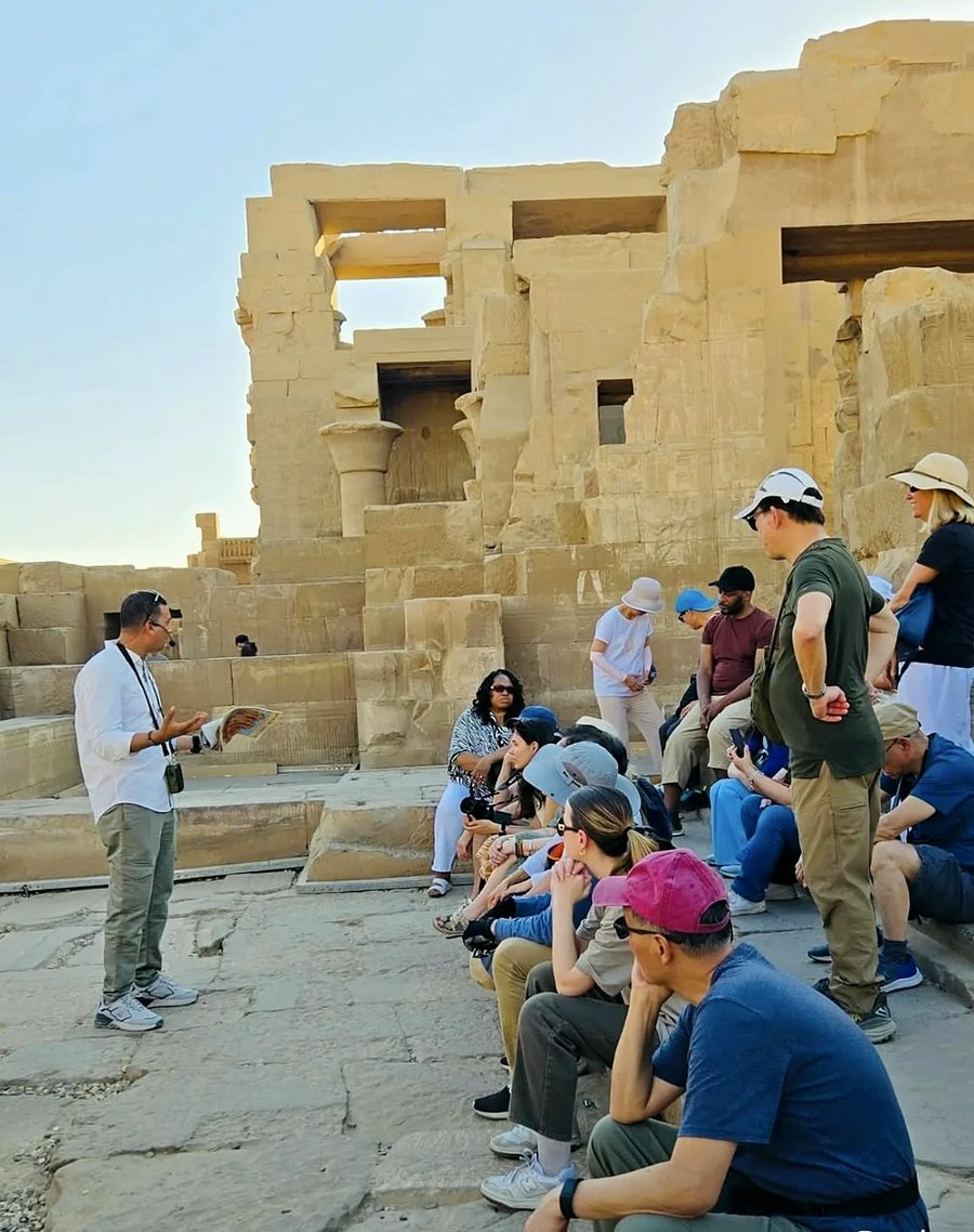 Nourbelle Egyptologist briefing a partner group at Kom Ombo Temple